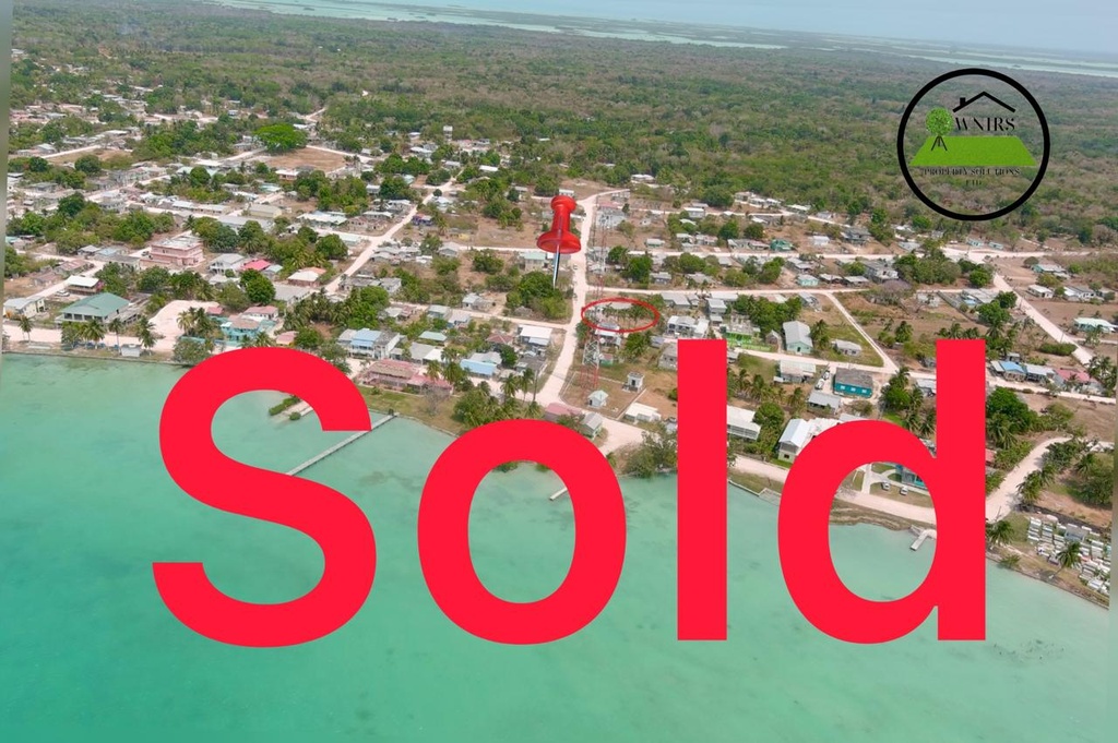 495.7 square meters of land being situated in the Sarteneja Registration Section